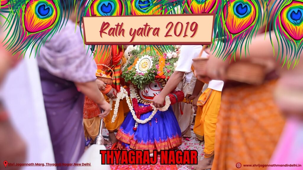 Lord Jagannath's beautifully decorated chariot (Rath) being pulled during Rath Yatra 2019 in Thyagaraj Nagar, Delhi.